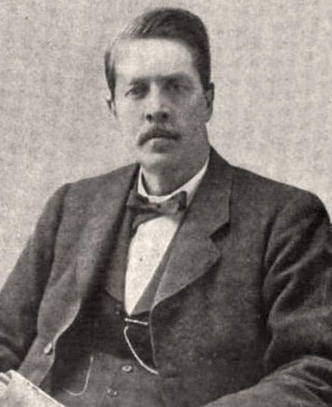 Hunter Holmes McGuire, seated